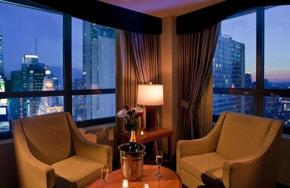 The living room of a DoubleTree Times Square guest room—complete with a "suite" view. | Photo from DoubleTree Suites by Hilton: New York City - Times Square