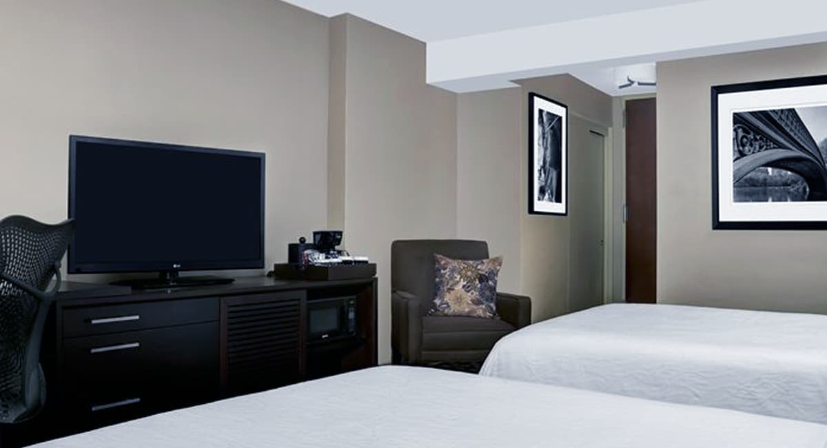 A contemporary-style double guest room at the prime Times Square location. | Photo from Hilton Garden Inn Times Square