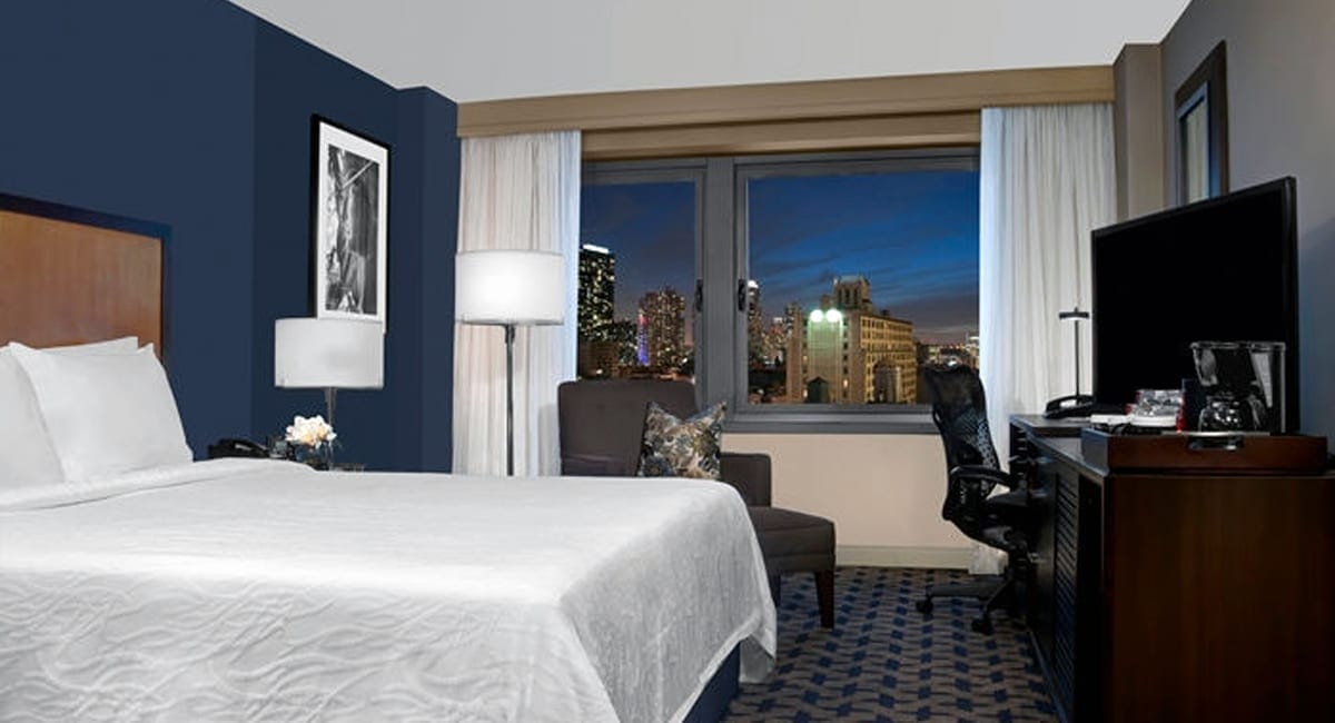 One of the 369 spacious guest rooms with contemporary décor. | Photo from Hilton Garden Inn Times Square