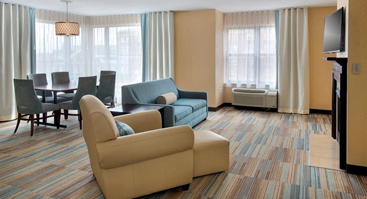 A comfortable and spacious guestroom lounge. | Photo from Hilton Garden Inn at Albany Medical Center