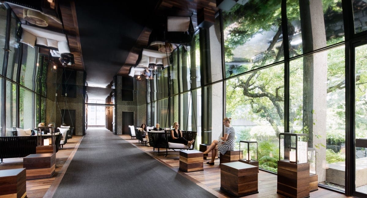 The stunning lobby, overlooking 2.5 acres of gardens and the outdoor pool. | Photo from Hotel Bonaventure Montréal