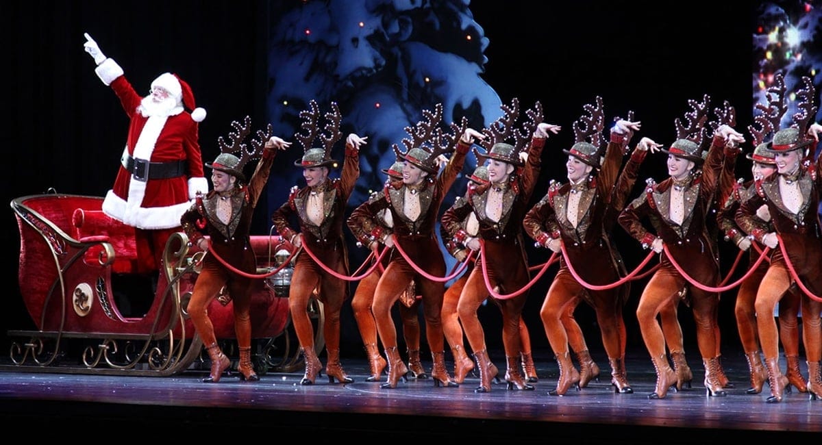 Santa Claus and The Rockettes line the stage at Radio City Music Hall. | Photo from Radio City Christmas Spectacular