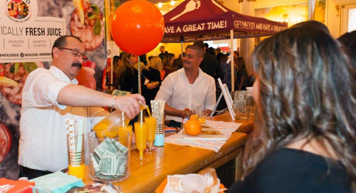 Vendors Pouring Mimosas at BrunchCon NYC | Photo from Brandon Hardin-Metro US