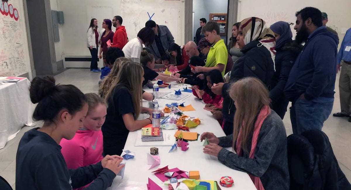 Festival Goers Making Origami at the Buffalo Cherry Blossom Festival | Photo from Buffalo Cherry Blossom Festival