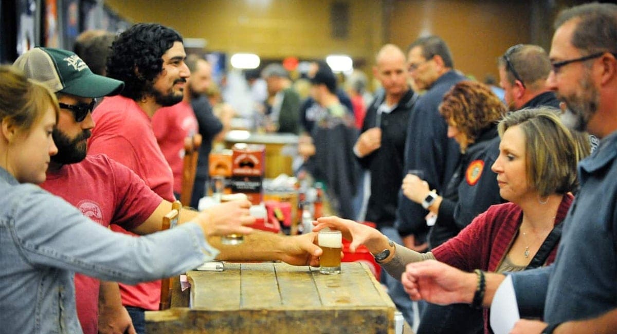 Visitors enjoying hundreds of local and imported craft beers at Saratoga Beer Week. | Photo from America-on-Tap