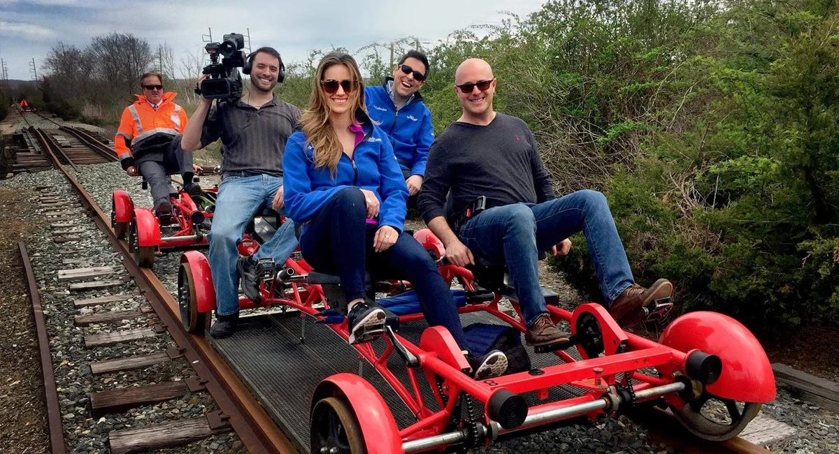 Guests pedaling down the tracks | Photo from Rail Explorers