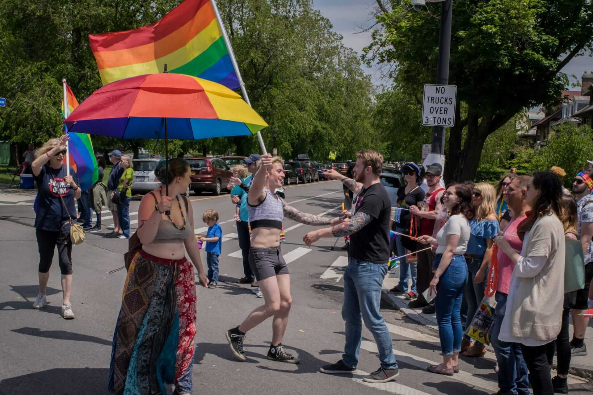 People hugging at Buffalo Pride parade