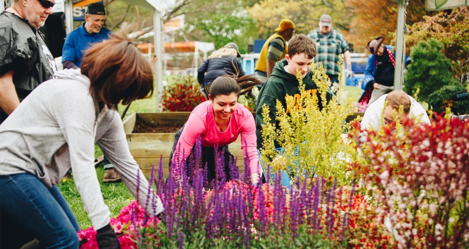 Rochester Lilac Festival | Family and friends enjoying lilacs. | Photo Courtesy of Andy Buscemi