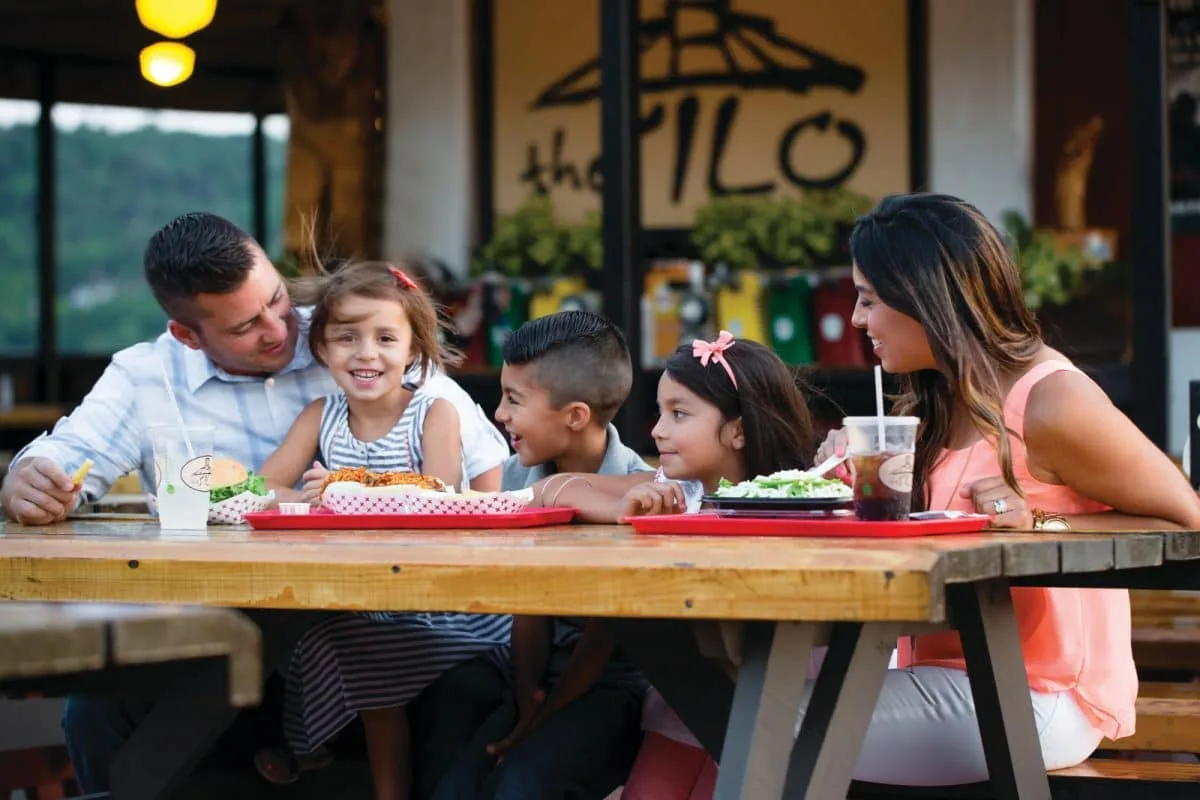 A family enjoying a classic American meal at the Silo.