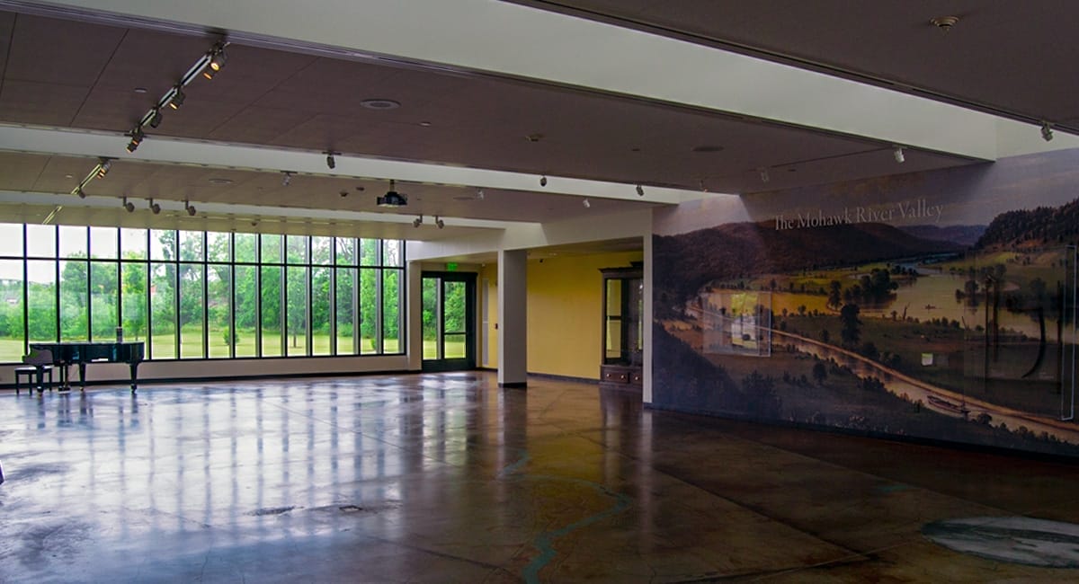 The Mohawk River Valley mural and entrance at the Arkell Museum. | Photo by Andrew Frey