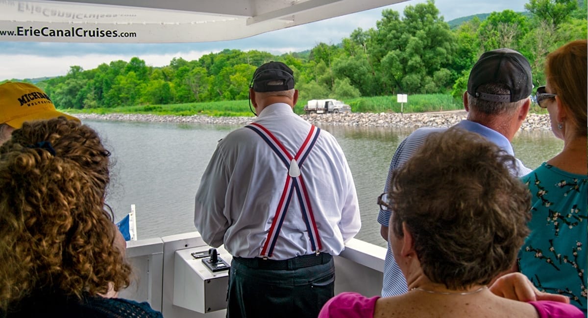 Captain Jerry Gertz guiding the boat, pointing out nearby wildlife from the Plantation Island Wildlife Management Area. | Photo by Andrew Frey