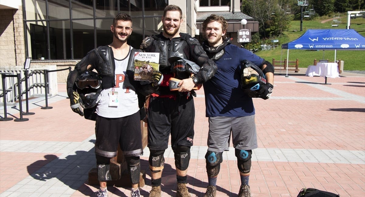 Trio of Mountain Bikers holding NYBR Magazine at Windham | Allyson Macci
