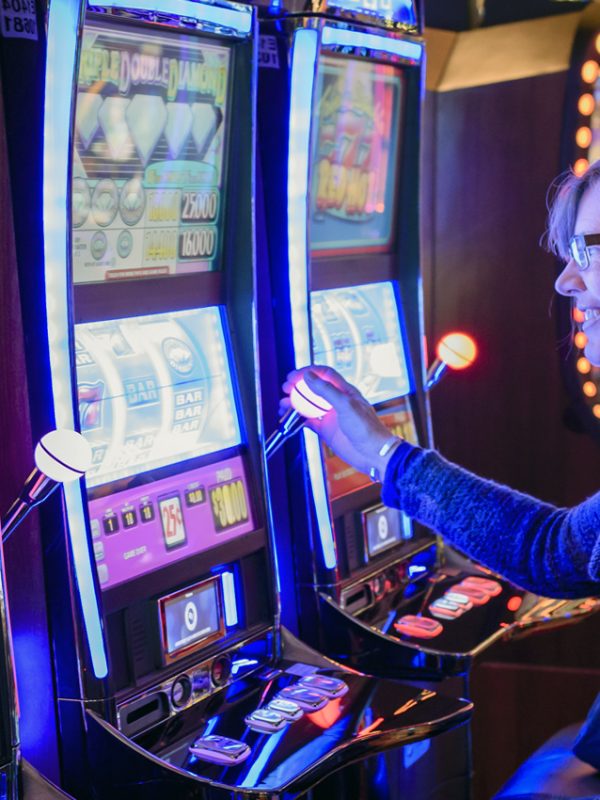 A woman playing slots at Rivers Casino & Resort. | Photo Courtesy of Andrew Shinn