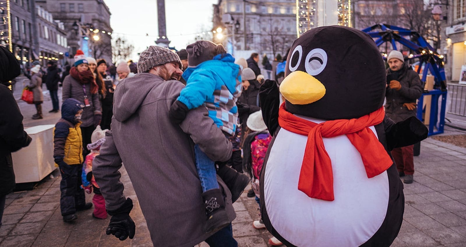 Montréal en Fêtes - Merry Montréal | Families enjoy winter fun at the Nordic Square in Old Montréal.