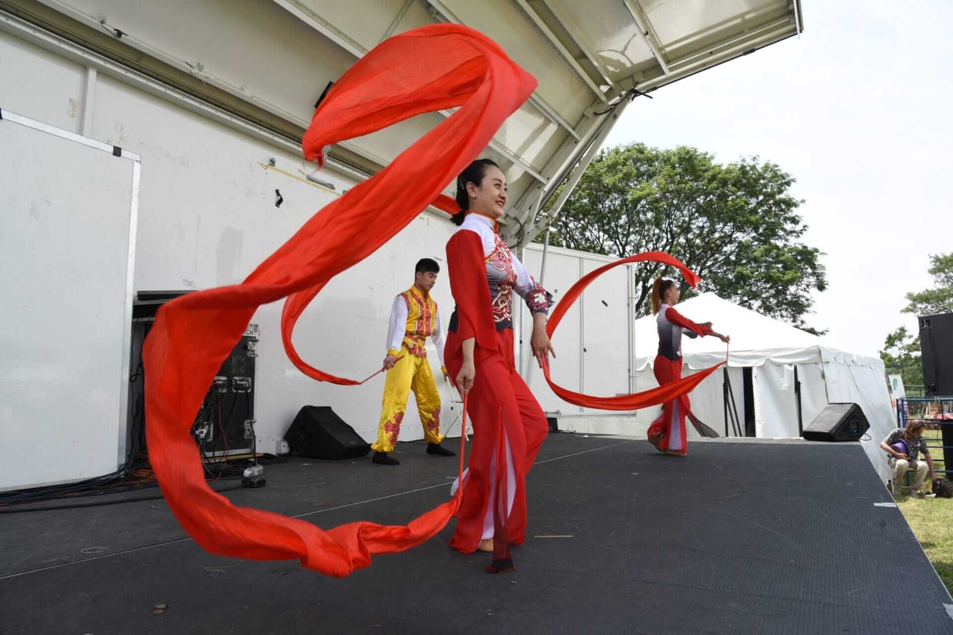 hong kong dragon boat festivsl dancers dancers at hong kong dragon boat festival on stage