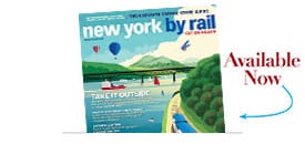 Magazine cover titled new york by rail featuring a scenic illustration of a river, boats, a train, and mountains in the background. The Elementor Header highlights "Available Now" with an arrow pointing to the magazine.