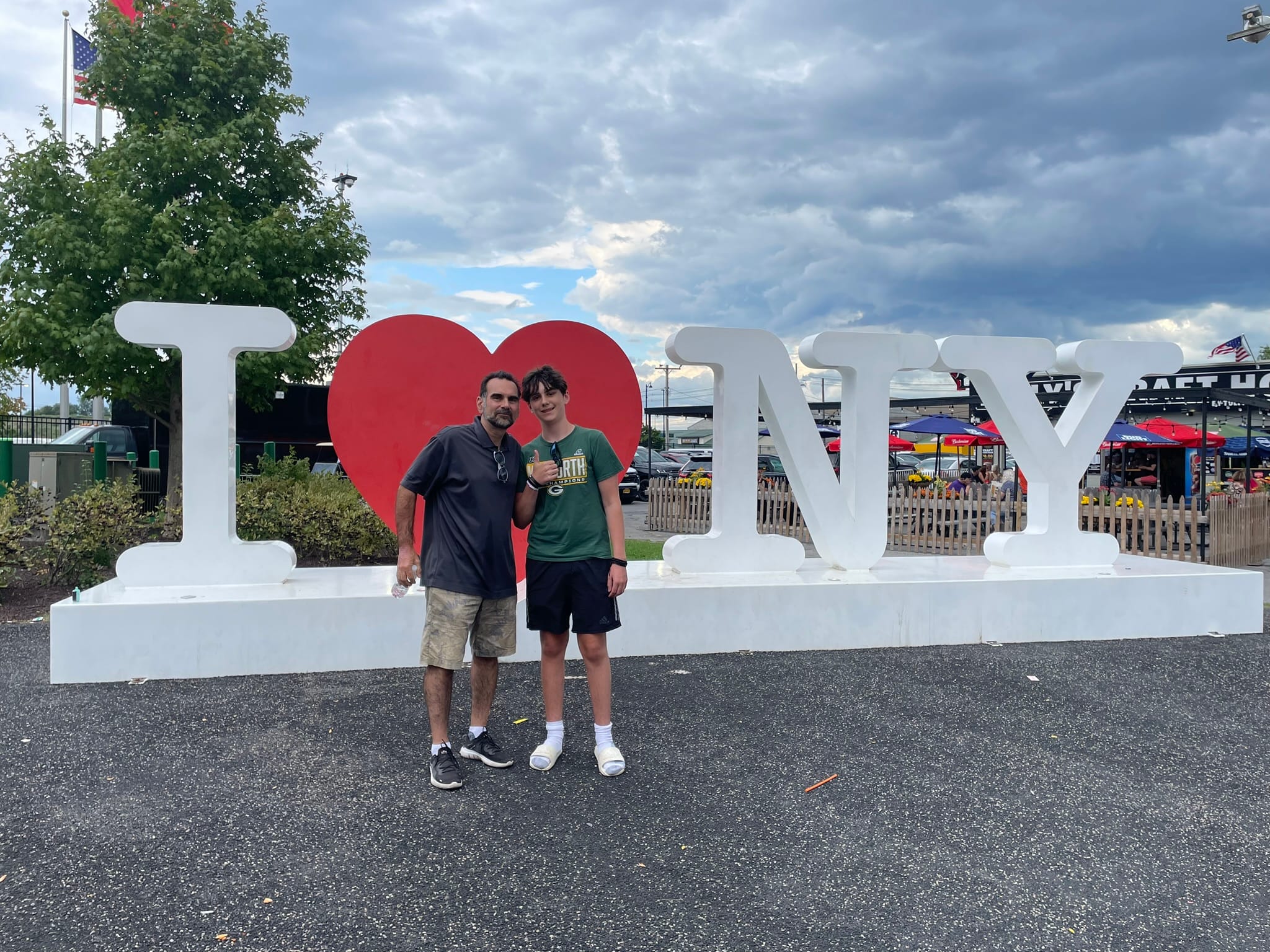 Tom & David Martinelli in front of the ILNY Sign in 2024